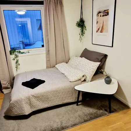 In Tromso, Located Between The Arctic Cathedral And The Cable Car *