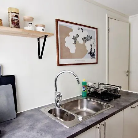 In Tromso, Located Between The Arctic Cathedral And The Cable Car With Ev Ch Station * Tromso