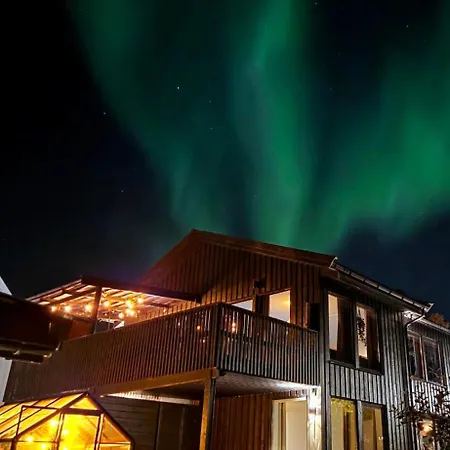 In Tromso, Located Between The Arctic Cathedral And The Cable Car With Ev Ch Station *